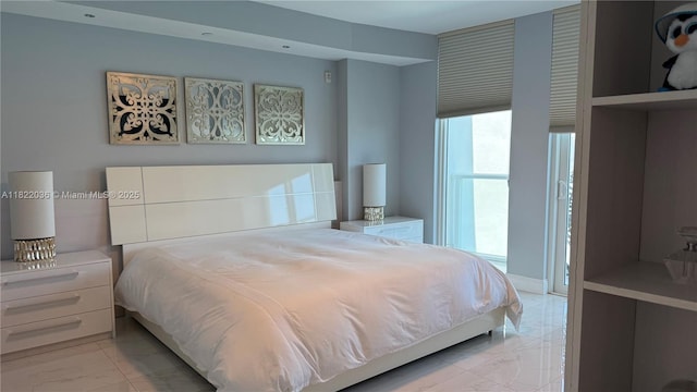 9821 E Bay Harbor Dr Unit 903, Bay Harbor Islands, FL 33154 - bedroom featuring marble finish flooring
