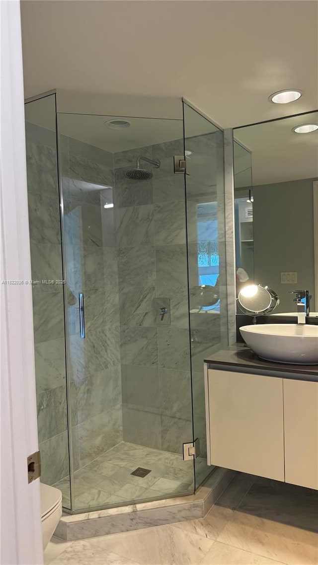9821 E Bay Harbor Dr Unit 903, Bay Harbor Islands, FL 33154 - bathroom with vanity, a shower stall, and recessed lighting