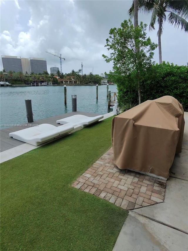 9821 E Bay Harbor Dr Unit 903, Bay Harbor Islands, FL 33154 - dock featuring a water view