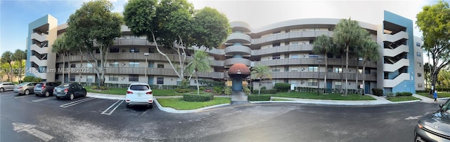 1100 Colony Point Cir Unit 504, Pembroke Pines, FL 33026 - view of apartment building / complex featuring uncovered parking