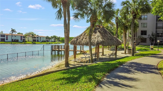 1100 Colony Point Cir Unit 504, Pembroke Pines, FL 33026 - dock featuring a gazebo, a water view, a residential view, and a lawn
