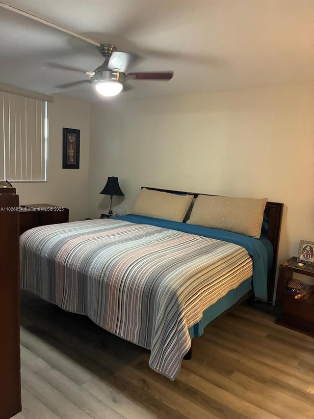 1100 Colony Point Cir Unit 504, Pembroke Pines, FL 33026 - bedroom featuring wood finished floors and a ceiling fan