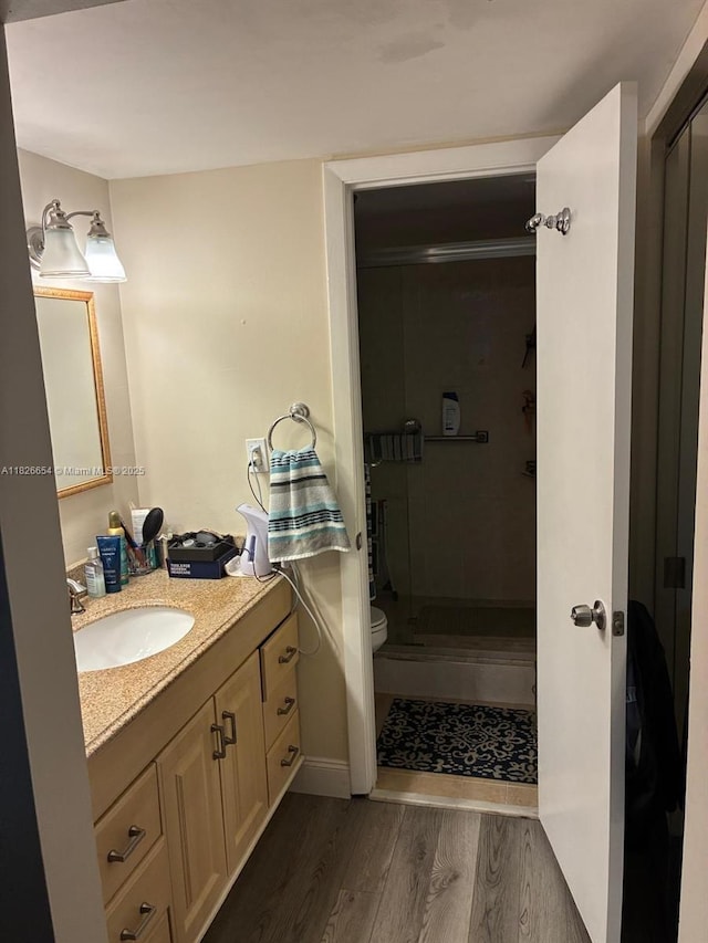 1100 Colony Point Cir Unit 504, Pembroke Pines, FL 33026 - bathroom with wood finished floors, vanity, and a shower stall