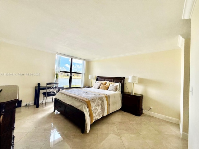 6404 Coral Lake Dr Unit 104, Margate, FL 33063 - bedroom featuring light tile patterned floors and crown molding
