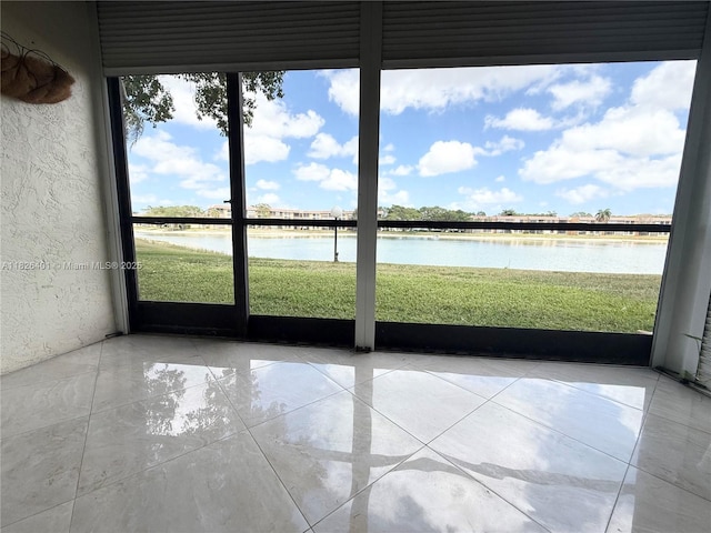 6404 Coral Lake Dr Unit 104, Margate, FL 33063 - unfurnished sunroom featuring a water view