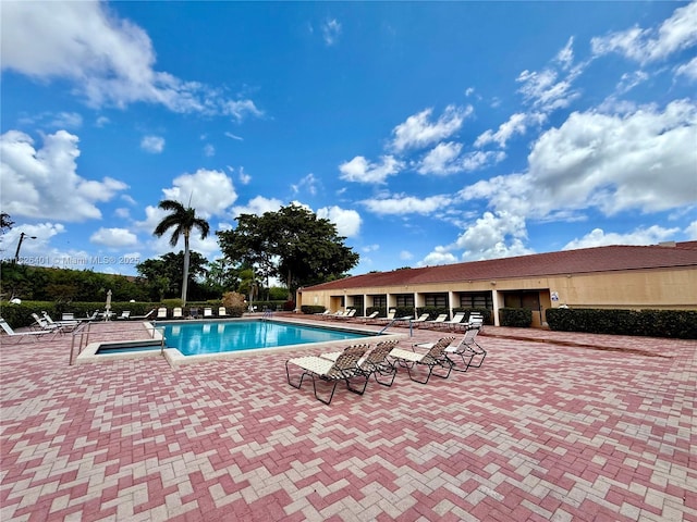 6404 Coral Lake Dr Unit 104, Margate, FL 33063 - community pool featuring a patio