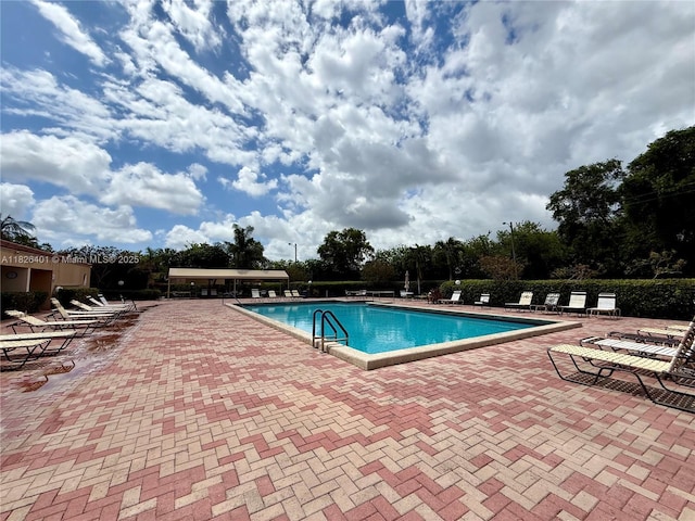 6404 Coral Lake Dr Unit 104, Margate, FL 33063 - community pool featuring a patio