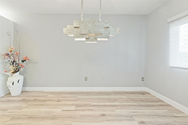 7727 Southampton Ter Unit 412, Tamarac, FL 33321 - unfurnished dining area featuring light wood-style floors and baseboards