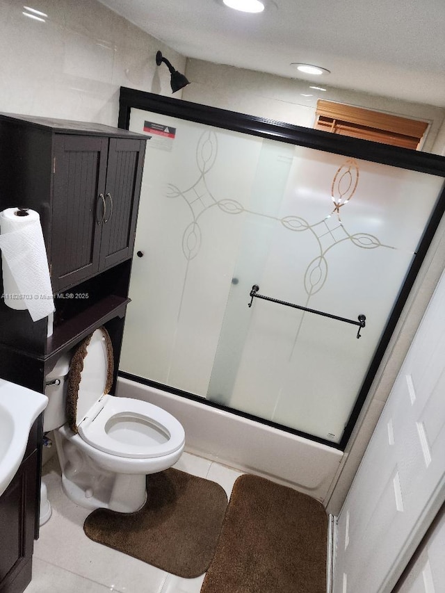 6311 NW 71st Ave, Tamarac, FL 33321 - full bath with shower / bath combination with glass door, tile patterned flooring, and vanity