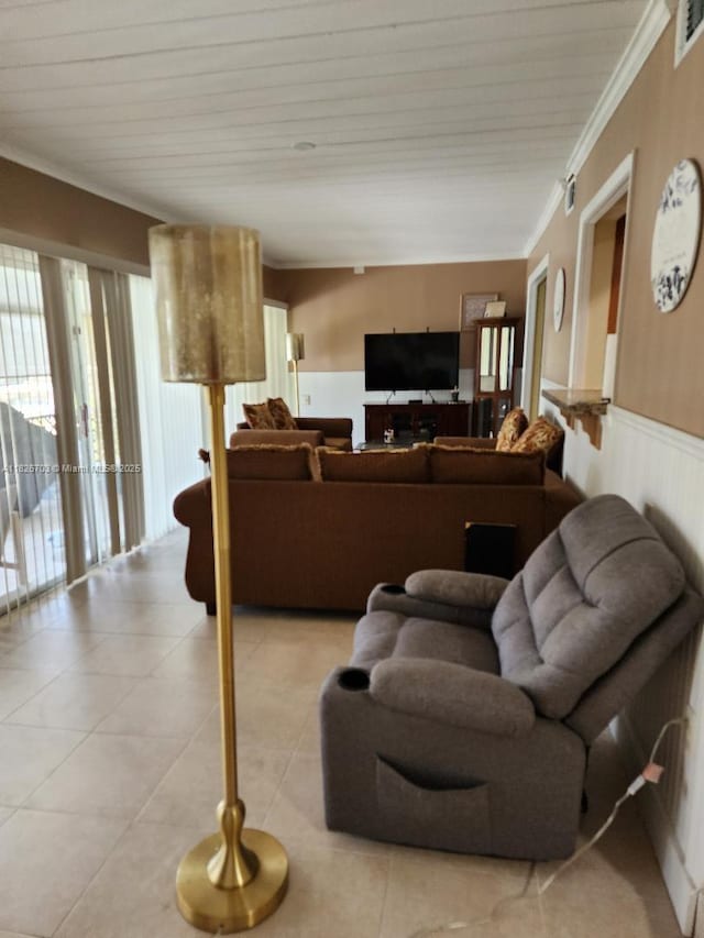 6311 NW 71st Ave, Tamarac, FL 33321 - living room featuring healthy amount of natural light, wainscoting, crown molding, and light tile patterned floors