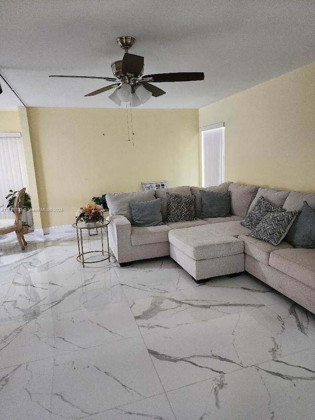 6311 NW 71st Ave, Tamarac, FL 33321 - living area with light marble finish floors and ceiling fan
