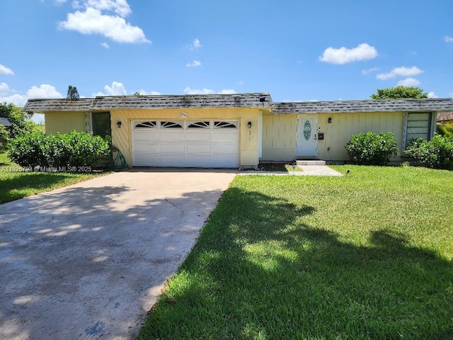 6311 NW 71st Ave, Tamarac, FL 33321 - ranch-style home featuring driveway, a front yard, and an attached garage