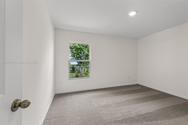 1230 Waterford, Palm Bay, FL 32909 - carpeted empty room featuring a textured ceiling and recessed lighting
