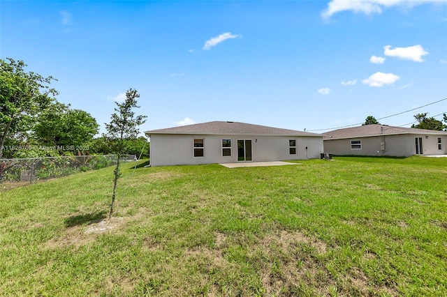 1230 Waterford, Palm Bay, FL 32909 - rear view of house with a patio area and stucco siding