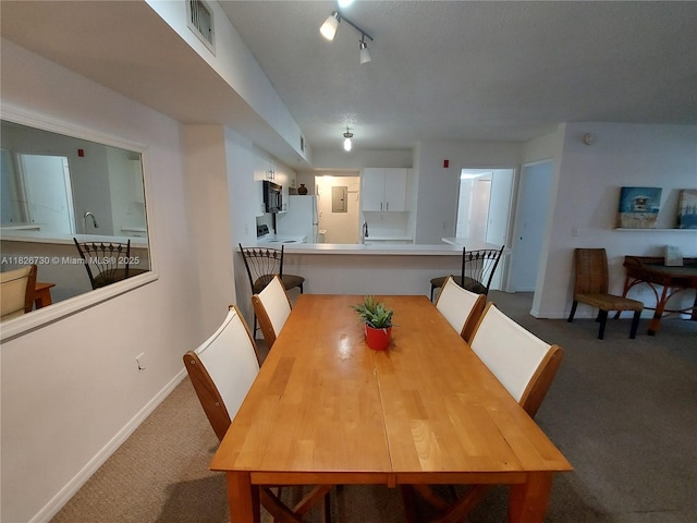 2640 S University Dr Unit 125, Davie, FL 33328 - dining space with carpet flooring and baseboards
