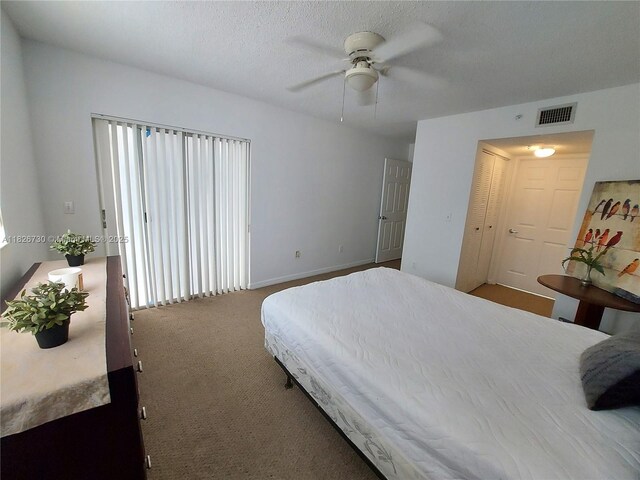2640 S University Dr Unit 125, Davie, FL 33328 - bedroom featuring carpet, a ceiling fan, and multiple windows