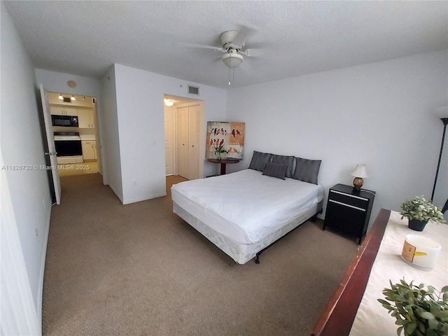 2640 S University Dr Unit 125, Davie, FL 33328 - bedroom featuring carpet and ceiling fan