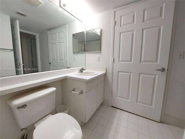 2640 S University Dr Unit 125, Davie, FL 33328 - half bathroom featuring vanity and tile patterned floors