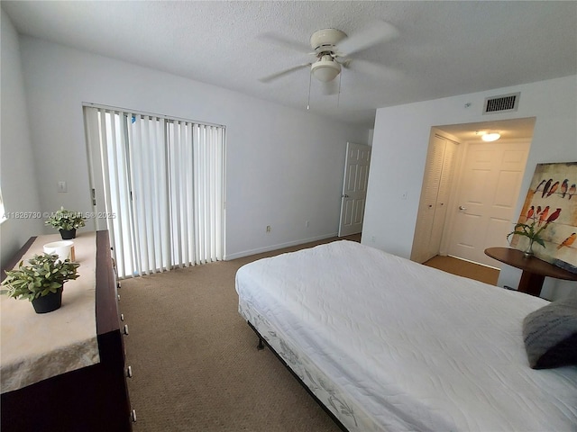 2640 S University Dr Unit 125, Davie, FL 33328 - bedroom with carpet floors, ceiling fan, and a textured ceiling