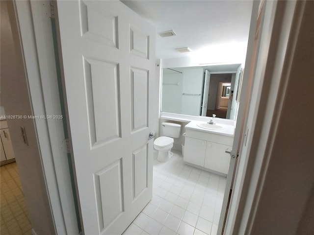 2640 S University Dr Unit 125, Davie, FL 33328 - bathroom featuring vanity and tile patterned floors