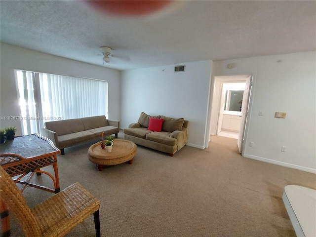 2640 S University Dr Unit 125, Davie, FL 33328 - living area with carpet flooring and a ceiling fan