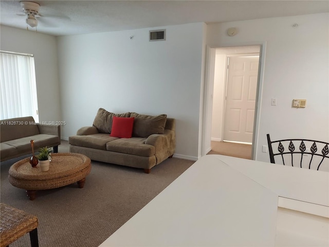 2640 S University Dr Unit 125, Davie, FL 33328 - living area with a ceiling fan and carpet floors