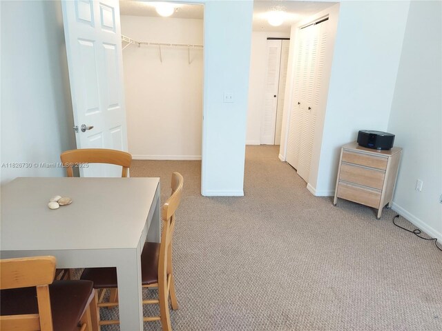 2640 S University Dr Unit 125, Davie, FL 33328 - dining space featuring carpet