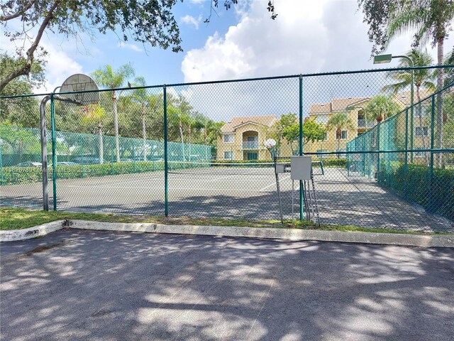 2640 S University Dr Unit 125, Davie, FL 33328 - view of tennis court with community basketball court