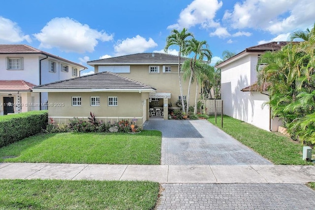 14783 SW 143rd Ter, Miami, FL 33196 - view of front of property featuring stucco siding and decorative driveway