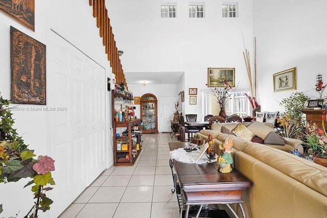14783 SW 143rd Ter, Miami, FL 33196 - living area with a towering ceiling and light tile patterned flooring