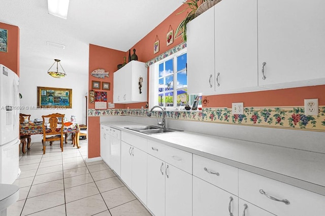 14783 SW 143rd Ter, Miami, FL 33196 - kitchen featuring light countertops, white cabinets, white appliances, pendant lighting, and light tile patterned floors