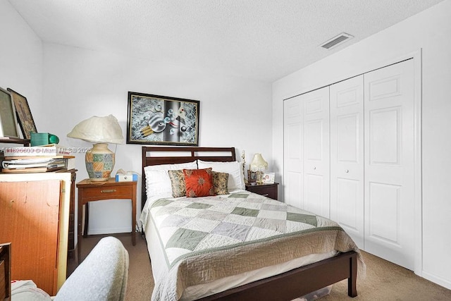 14783 SW 143rd Ter, Miami, FL 33196 - carpeted bedroom featuring a textured ceiling and a closet