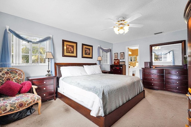 14783 SW 143rd Ter, Miami, FL 33196 - bedroom with carpet flooring, connected bathroom, a textured ceiling, and ceiling fan