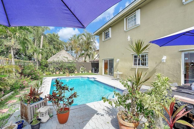 14783 SW 143rd Ter, Miami, FL 33196 - view of pool featuring a fenced backyard and a patio area