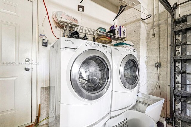 14783 SW 143rd Ter, Miami, FL 33196 - washroom with washer and clothes dryer
