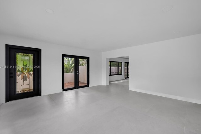 220 NE 105th St, Miami Shores, FL 33138 - unfurnished room featuring french doors