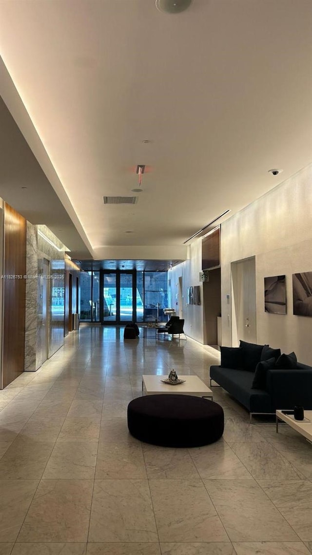 68 SE 6th St Unit 2804, Miami, FL 33131 - community lobby featuring a wall of windows