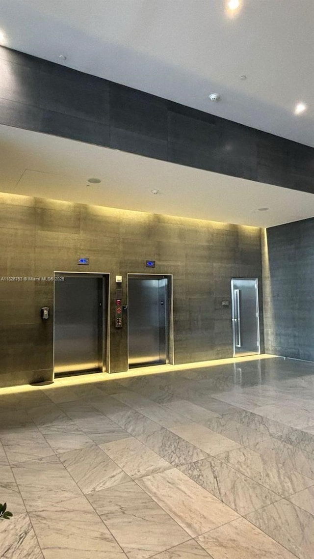 68 SE 6th St Unit 2804, Miami, FL 33131 - building lobby with recessed lighting