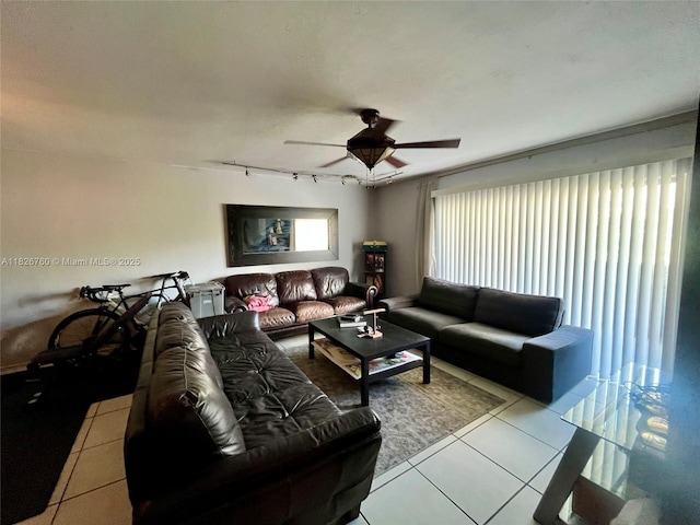 8325 SW 72nd Ave Unit 214C, Miami, FL 33143 - living area with track lighting, tile patterned flooring, and a ceiling fan