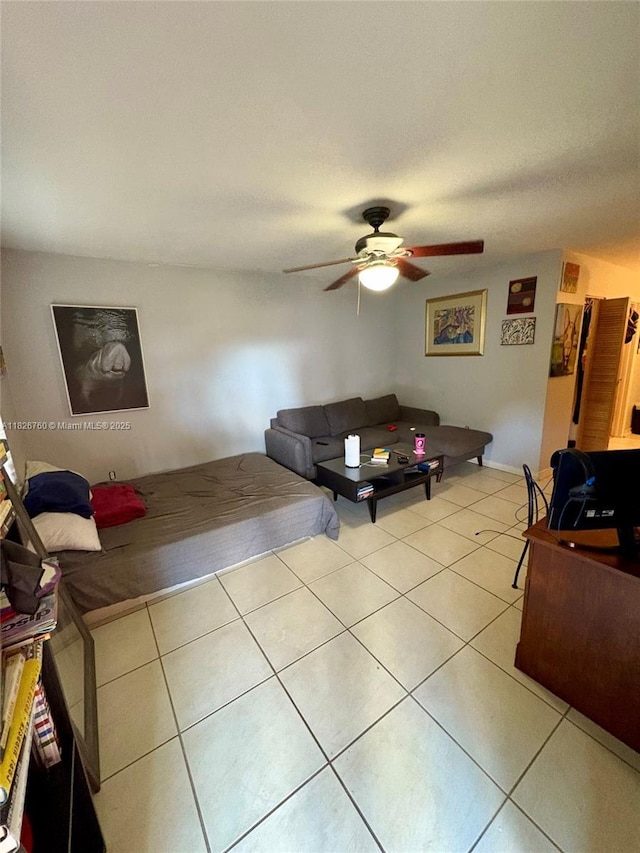 8325 SW 72nd Ave Unit 214C, Miami, FL 33143 - living area featuring a ceiling fan and light tile patterned floors