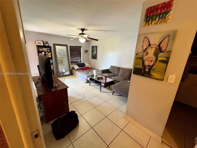8325 SW 72nd Ave Unit 214C, Miami, FL 33143 - living room featuring a ceiling fan and light tile patterned floors