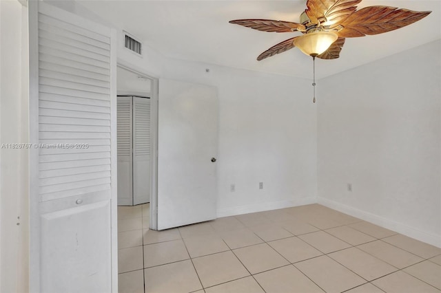 13800 SW 5th Ct Unit 101M, Pembroke Pines, FL 33027 - spare room featuring ceiling fan and light tile patterned floors
