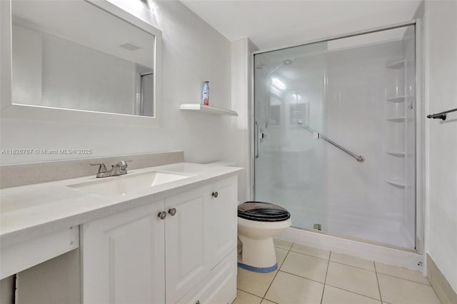 13800 SW 5th Ct Unit 101M, Pembroke Pines, FL 33027 - bathroom featuring a shower stall, vanity, and tile patterned flooring
