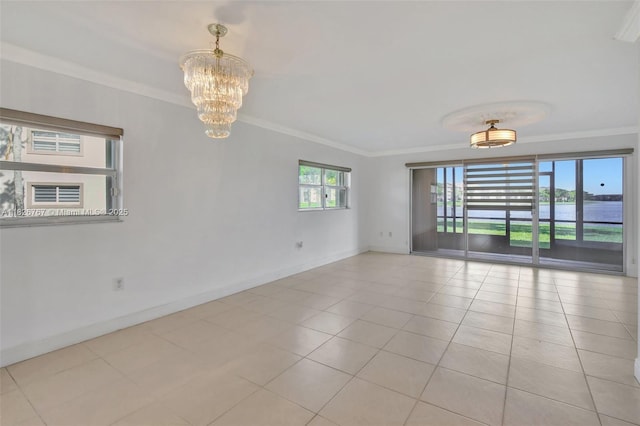 13800 SW 5th Ct Unit 101M, Pembroke Pines, FL 33027 - tiled empty room featuring a chandelier and ornamental molding