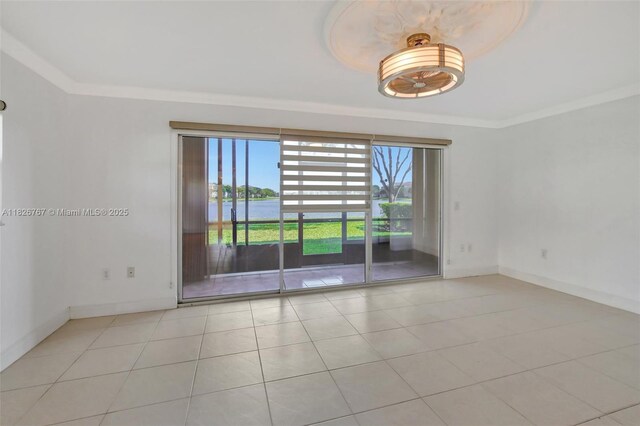 13800 SW 5th Ct Unit 101M, Pembroke Pines, FL 33027 - tiled spare room with crown molding and a water view