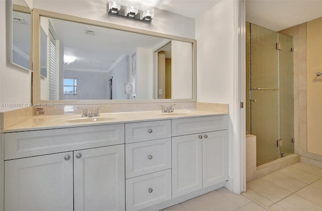 13800 SW 5th Ct Unit 101M, Pembroke Pines, FL 33027 - bathroom featuring tile patterned floors, double vanity, and a stall shower