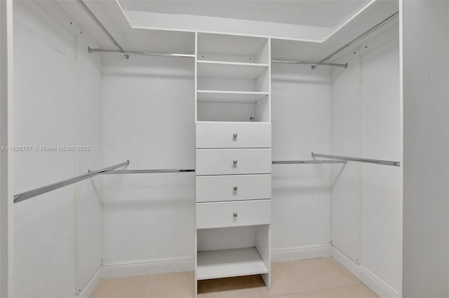 13800 SW 5th Ct Unit 101M, Pembroke Pines, FL 33027 - spacious closet featuring light tile patterned floors