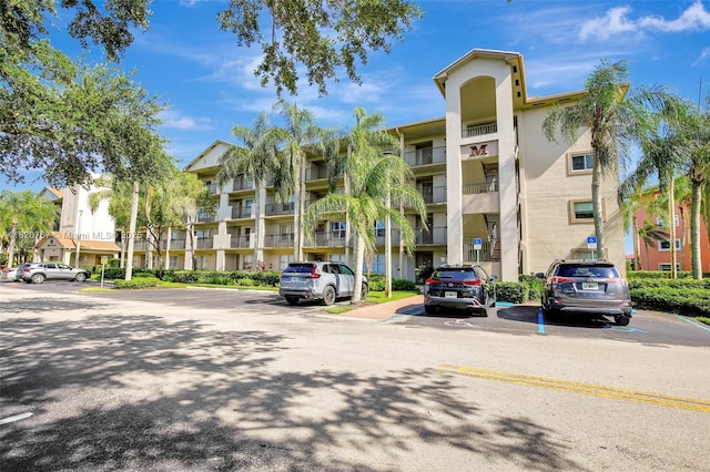 13800 SW 5th Ct Unit 101M, Pembroke Pines, FL 33027 - view of apartment building / complex with uncovered parking