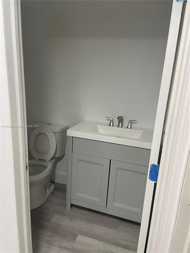 671 NE 195th St Unit 228E, Miami, FL 33179 - bathroom with vanity and wood finished floors