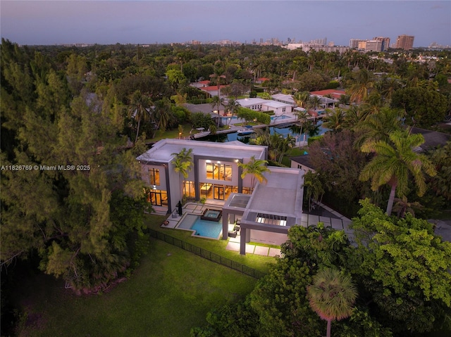1009 NE 104th St, Miami Shores, FL 33138 - aerial view at dusk of view of pool